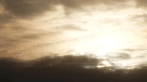 Cloudy sky, white sun behind clouds at sunrise - sky background - Time Lapse Stock Footage 150008701