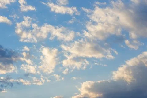 Cloudy sky in yellow light Foto stock