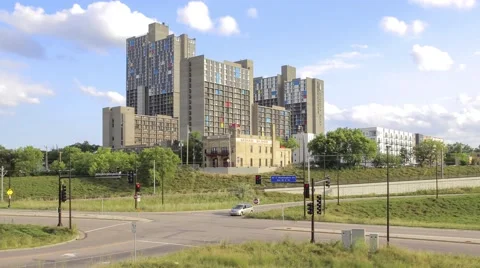 Cloudy Skyline and Train and Car Traffic Stock Footage 67751853