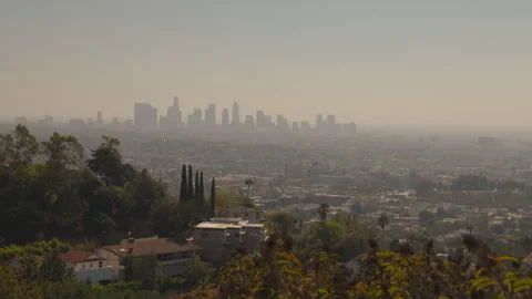 A cloudy slightly muddy view of Los Angeles, with downtown in shadow. Stock Footage 319347119