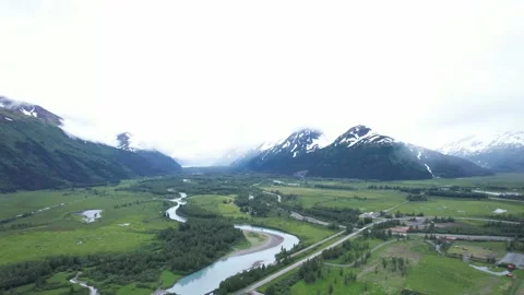 Cloudy Snow Covered Mountains in Rural Alaska Video stock 217831150