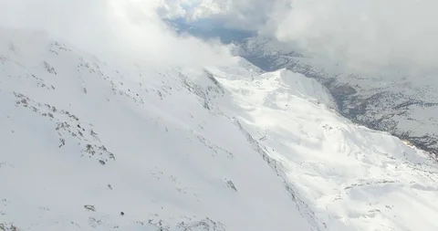 Cloudy Snow Mountain Aerial View Video stock 118957517