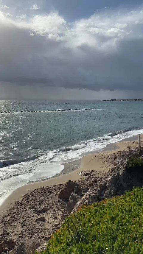Cloudy storm weather with waves near the sea beach. HD footage Stock Footage 238524903