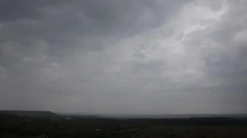 On the cloudy summer sky comes the rain Stock Footage 131116005