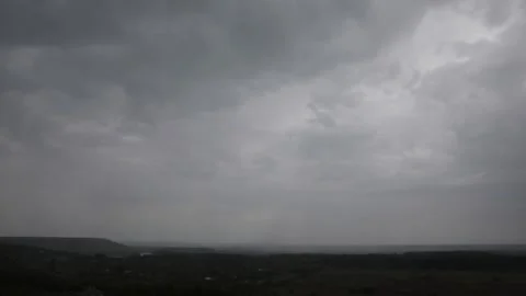 On the cloudy summer sky comes the rain Stock Footage 131116055