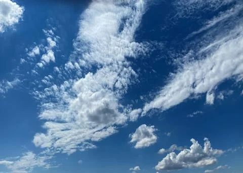 Cloudy summer sky Stock Photos