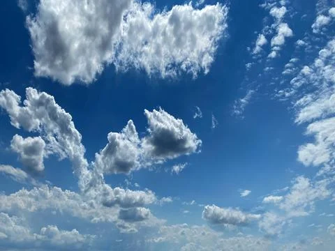 Cloudy summer sky Stock Photos
