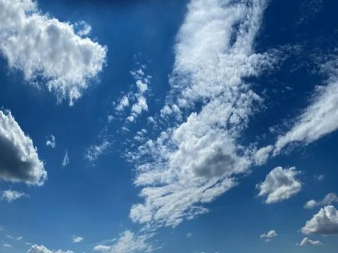 Cloudy summer sky Stock Photos