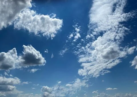 Cloudy summer sky Stock Photos