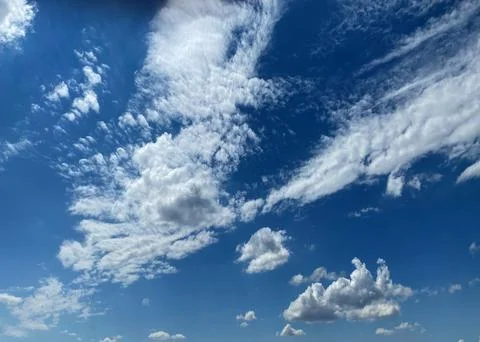 Cloudy summer sky Stock Photos