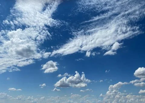 Cloudy summer sky Stock Photos