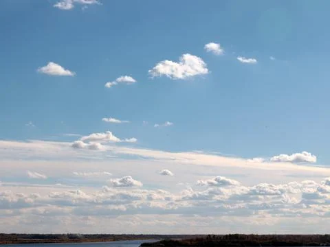 Cloudy summer sky Stock Photos