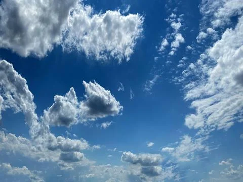 Cloudy summer sky Stock Photos