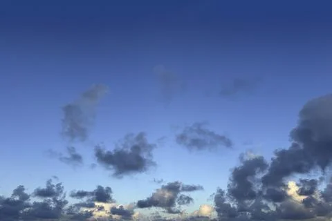 Cloudy summer sky with small clouds for use as a background texture Foto stock