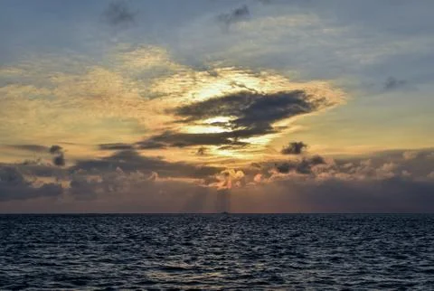 Cloudy sun raise Stock Photos