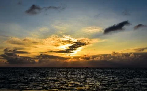 Cloudy sun raise Stock Photos