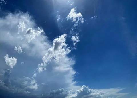 Cloudy sunny sky Stock Photos