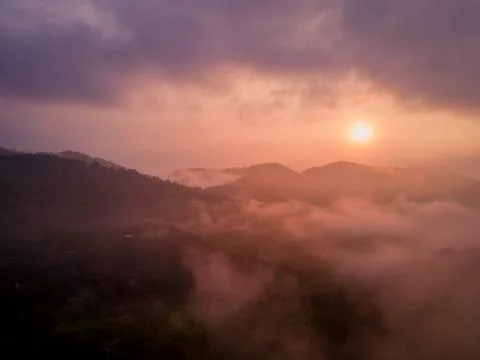 Cloudy sunrise Stock Photos