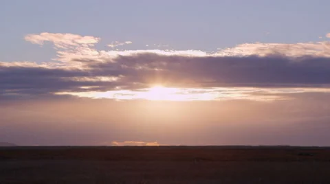 Cloudy sunrise Timelapse prairie Stock Footage 32536241