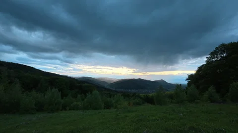 Cloudy sunset in beautiful spring or summer mountains Stock Footage 330677459