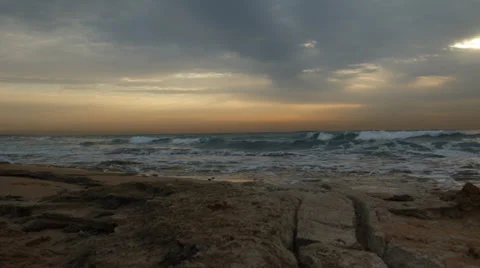 Cloudy Sunset on a chilly shorline Stock Footage 34369886