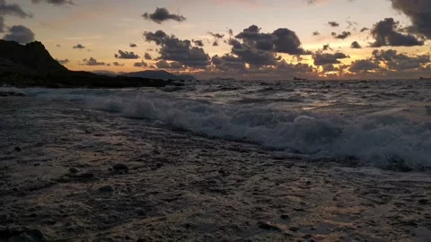 Cloudy sunset on the coast Stock Footage 135353287