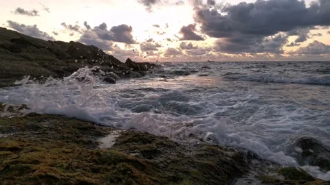 Cloudy sunset on the coast Stock Footage 135353588