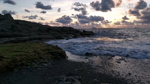 Cloudy sunset on the coast Stock Footage 135353656