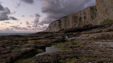Cloudy sunset on the coast Stock Footage 135353704