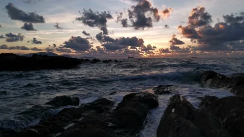 Cloudy sunset on the coast Stock Footage 135353891