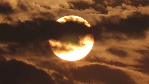 Cloudy sunset, colorful sky background .Big Sun In Orange Sky Stock Footage 121435892