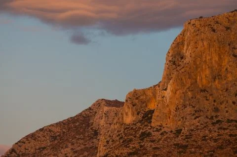 Cloudy sunset in crete Stock Photos