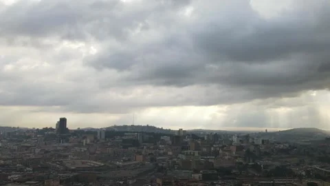 A cloudy sunset in kampala drone shot Stock Footage 246567059