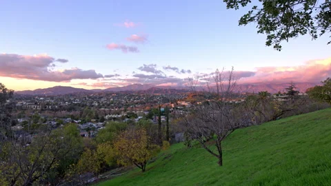 Cloudy Sunset Los Angeles Mountains with Coyotes Timelapse Stock Footage 228528079