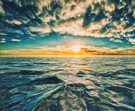 Cloudy sunset or sunrise reflected on choppy water Stock Photos