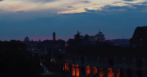 Cloudy Sunset over ancient Rome together with the Forums and the Colosseum Stock Footage 156049840