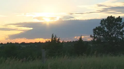 Cloudy sunset over hills of cedar and scrub oak Video stock 8956668