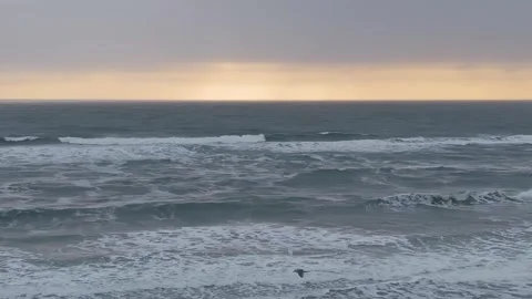 Cloudy Sunset over Ocean Waves Stock Footage 307237229