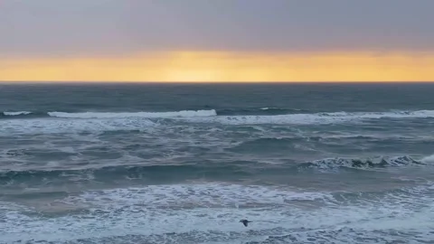 Cloudy Sunset over Ocean Waves Stock Footage 341774184