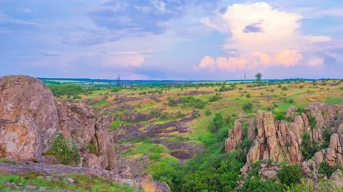 Cloudy Sunset over the Rock Canyon Stock Footage 147084328