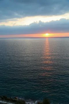 Cloudy Sunset over sea Stock Photos
