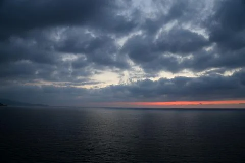 Cloudy Sunset over sea Foto stock