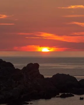 Cloudy sunset Stock Photos