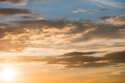 Cloudy sunset sky background Stock Photos