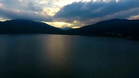 Cloudy sunset through the mountains Stock Footage 110846044