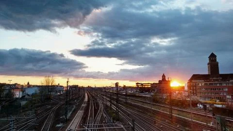 Cloudy Sunset on the Train Rails Stock Photos