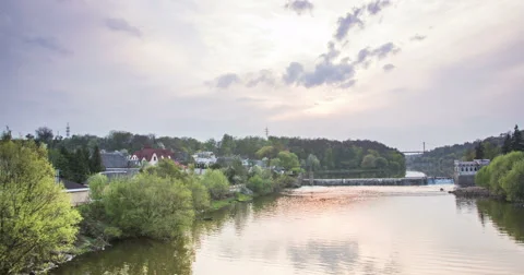 Cloudy sunset on windy day dam Stock Footage 63987933