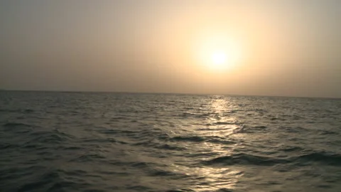 Cloudy sunshine in the middle of the sea Stock Footage 231487697