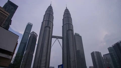 Cloudy time lapse of KLCC (Kuala Lumpur City Center) or Kuala Lumpur Twin Tower. Stock Footage 155701370