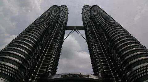 A cloudy time-lapse of the Petronas Towers in Kuala Lumpur, Malaysia 動画素材 58493909